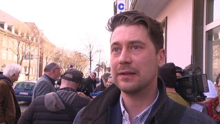 Sergej Minich, Stellvertretender Landesvorsitzender der AfD, bei einem Interview.