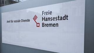 Auf einem Schild steht die Aufschrift "Amt für soziale Dienste".