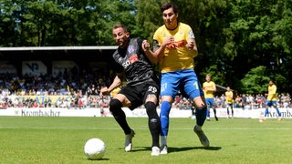 Dominic Volkmer im Zweikampf mit Osnabrücks Marc Heider.