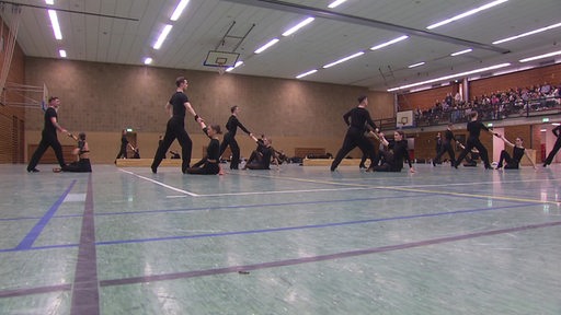 Der Mitglieder des Grün-Gold-Clubs trainieren in einer Halle in Bremen.