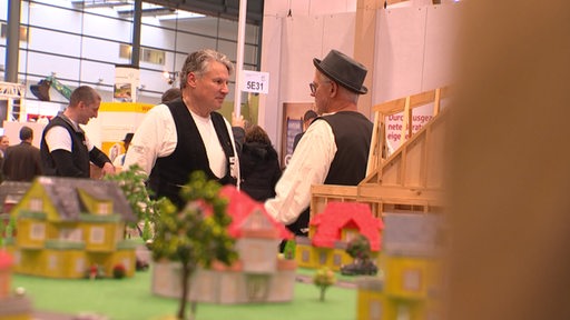 Zimmermänner auf der Messe "Altbautage"